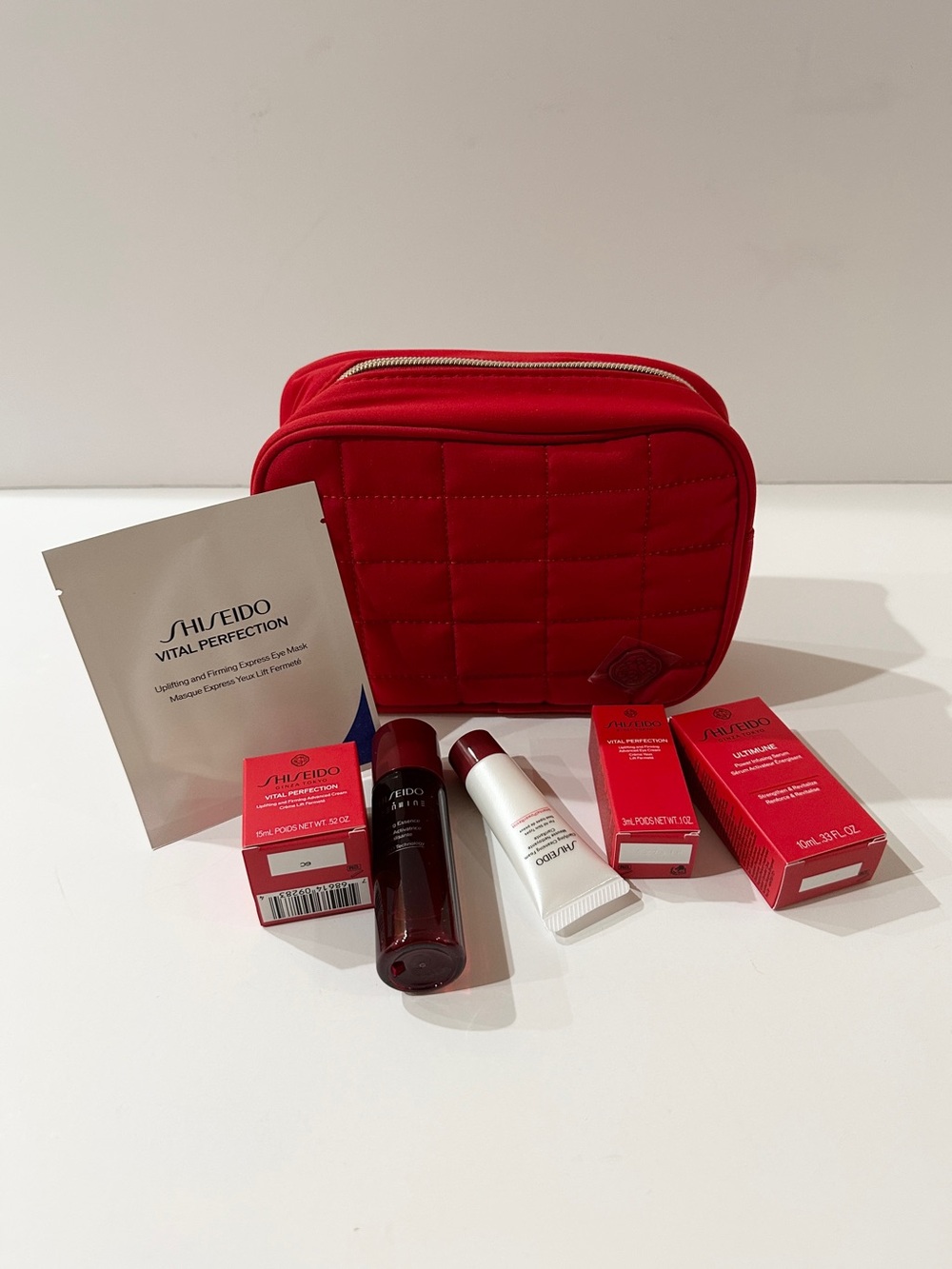 NWOT Shiseido Red Quilted Cosmetic Case with Mini Skincare Set